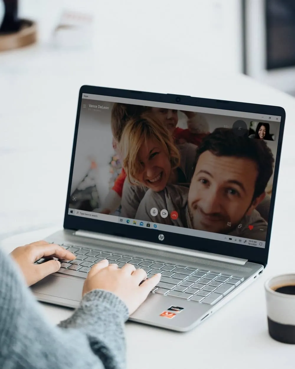 Laptop showing two people on a video call